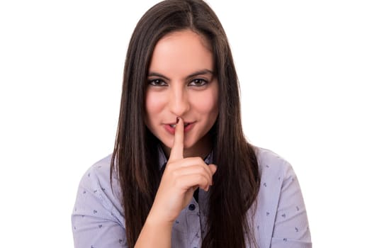 Beautiful young woman asking for silence isolated