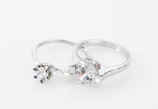 Close up Diamond gem wedding rings on white  background, Jewelry wedding diamond rings on white background