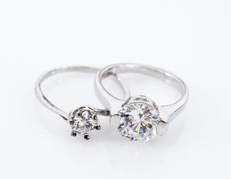 Close up Diamond gem wedding rings on white  background, Jewelry wedding diamond rings on white background