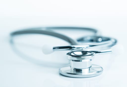 Stethoscope for doctor checkup in health medical laboratory table as medical concept