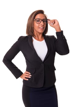 Young woman with glasses posing isolated over white