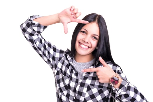 Young woman making framing key gesture - isolated over white