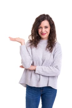 Young beautiful woman presenting your product, isolated over white background