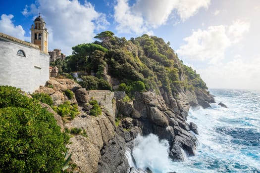 Italian Riviera coast near the village of Portofino with the view of Castello Brown and Chiesa di San Giorgio