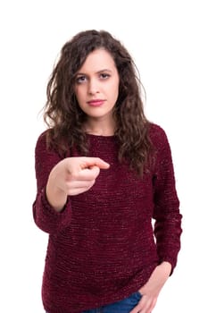Young beautiful woman pointing at you, isolated over white