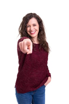 Young beautiful woman pointing at you, isolated over white