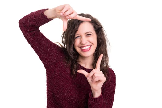 Young woman making framing key gesture - isolated over white
