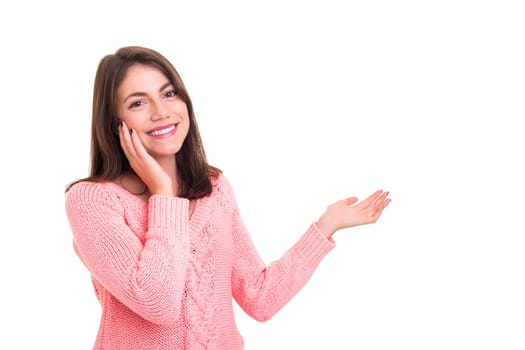 Young beautiful woman presenting your product, isolated over white background
