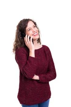 Young beautiful woman at the phone, isolated over a white background
