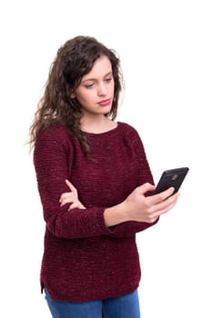 Young beautiful woman at the phone, isolated over a white background