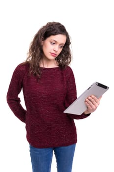beautiful woman working with a new tablet computer, isolated over white background
