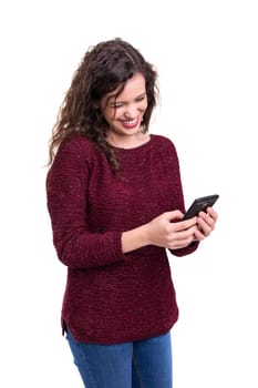 Young beautiful woman at the phone, isolated over a white background