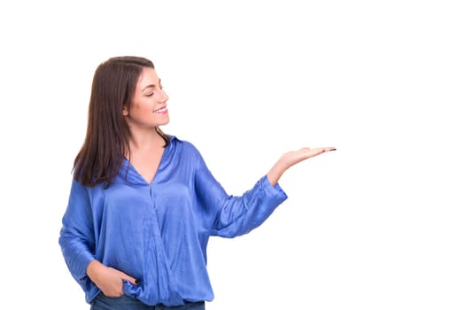 Young beautiful woman presenting your product, isolated over white background