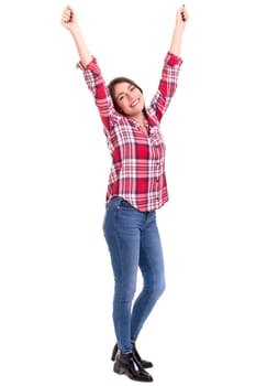 Studio shot: Happy woman with raised arms