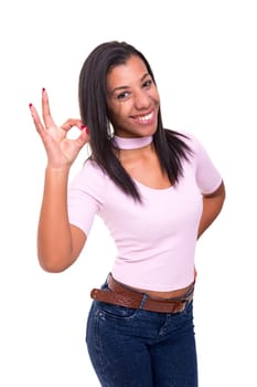 Beautiful african young woman signaling ok, isolated over white