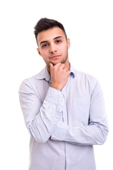 Studio picture of a young and handsome man posing isolated
