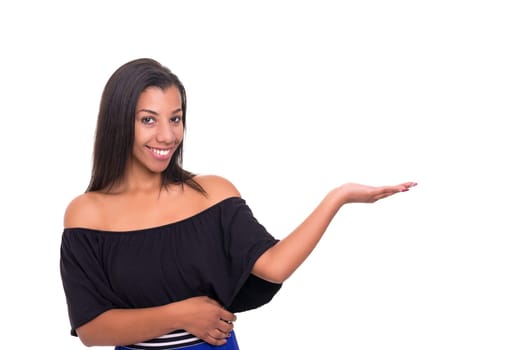 Young beautiful african woman presenting your product, isolated over white background