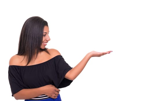 Young beautiful african woman presenting your product, isolated over white background