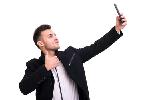 Young man at the phone, isolated over white background