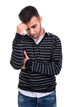 Troubled young man posing isolated over white background