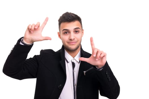 Happy young man framing photography, isolated over white