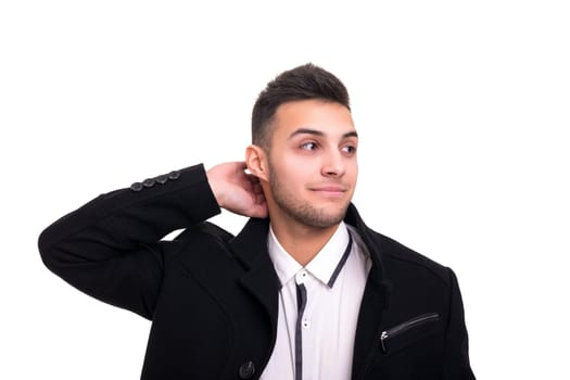 Studio picture of a young and handsome man posing isolated