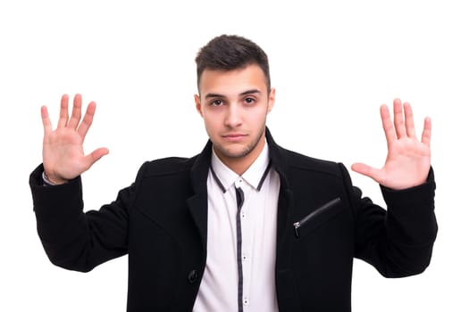 Young business man ordering you to stop