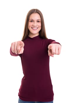 Young beautiful woman pointing at you, isolated over white