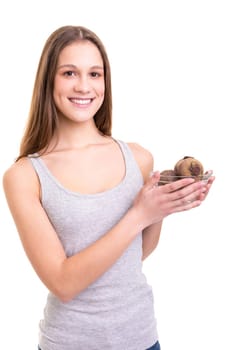 Beautiful blonde woman holding some fresh beets, isolated over white background