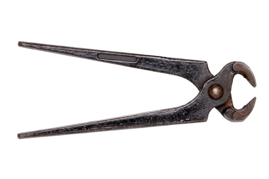 Carpenter tools isolated. Old open rusty pinching pliers to used for removing nails from wood. Clipping path. Macro of vintage tools.