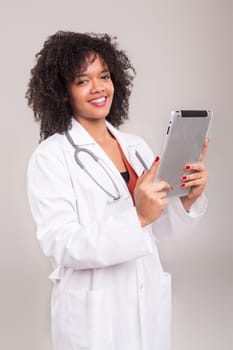 Studio shot of a beautiful african doctor
