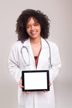 Studio shot of a beautiful african doctor