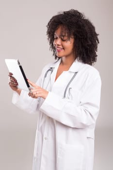 Studio shot of a beautiful african doctor