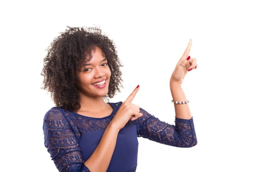 Young beautiful african woman presenting your product, isolated over white background