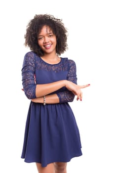 Young beautiful african woman presenting your product, isolated over white background