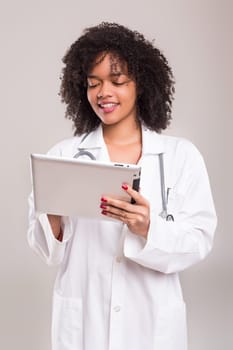 Studio shot of a beautiful african doctor