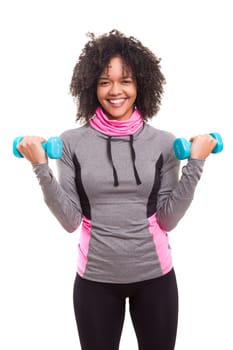 Studio shot of a beautiful african woman exercising