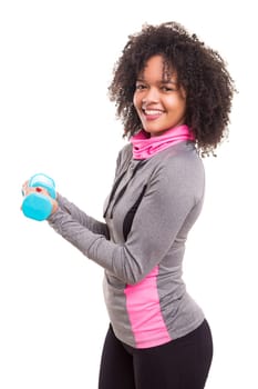 Studio shot of a beautiful african woman exercising