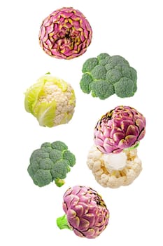 Isolated vegetables. Seven mixed of broccoli, artichokes and cauliflower in the air on white with clipping path as package design element. Full depth of field. Food levitation concept