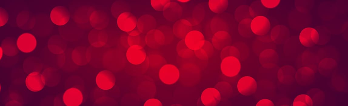 Multicolored blurry bokeh on a red background - Panorama