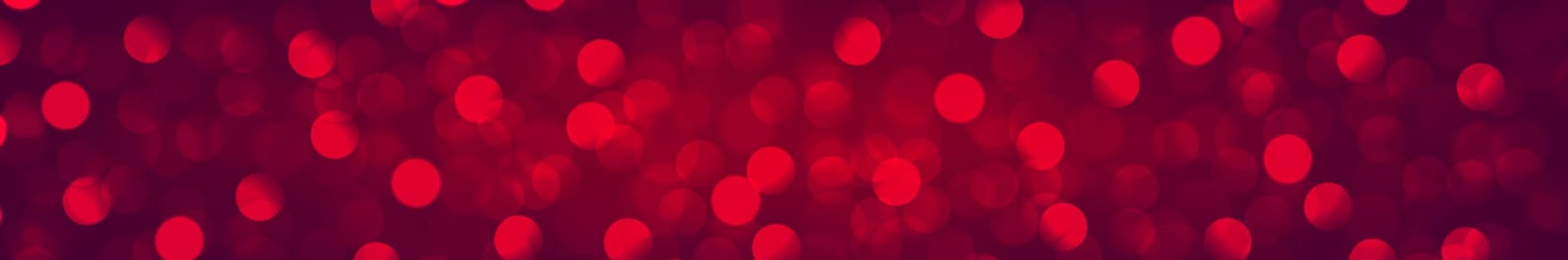 Multicolored blurry bokeh on a red background - Panorama