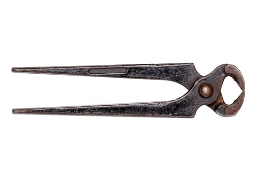 Craftsman tools isolated.  Old open rusty pinching pliers to used for removing nails from wood. Macro of vintage tools.