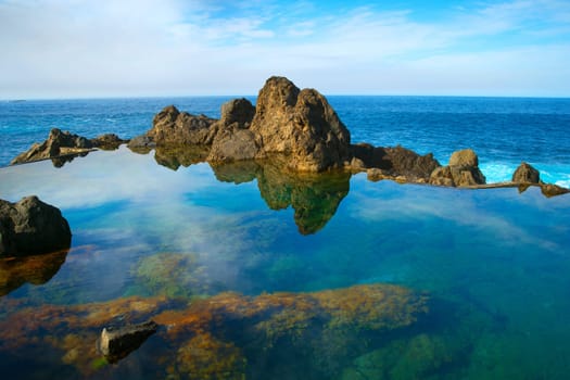 Bathes in natural lava ocean pools. Lava pools are the main attraction of Madeira.