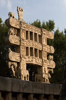 Sunlit torana at eastern gateway of Stupa at Sanchi, near Bhopal, Madhya Pradesh, India, Asia