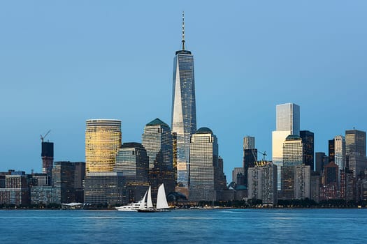 New York City skyline with urban skyscrapers at sunset, USA.