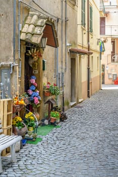 Nice  village street with flowers in Italy near Rome