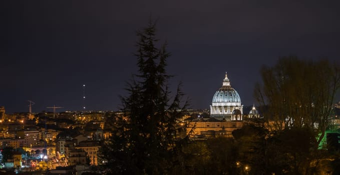 Landascape of Rome and the San Peter Cathedral dome in the night