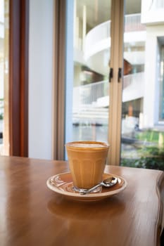 Morning hot coffee latte at resort cafe, stock photo