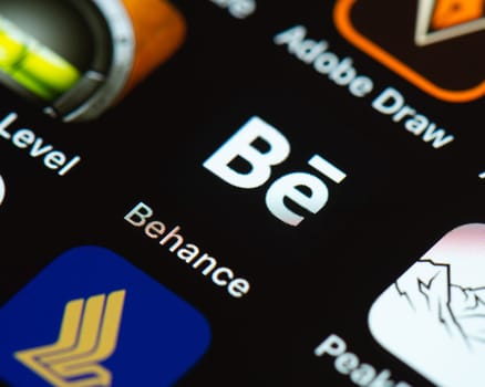 BAYONNE, FRANCE - CIRCA JANUARY 2021: Adobe Behance app icon on Apple iPhone screen. Behance is a social media platform for creatives, it is owned by Adobe.