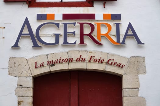 ESPELETTE, FRANCE - CIRCA JANUARY 2021: Agerria sign outside shop. Agerria is a foie gras and Irouleguy wine producer from the French Basque Country.